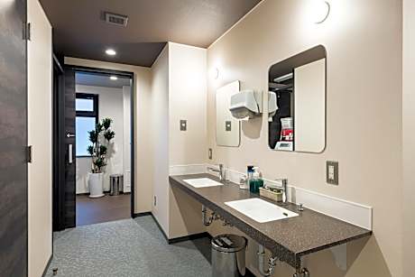 2 Single Beds with TV in 12 Beds Mixed Dormitory Room