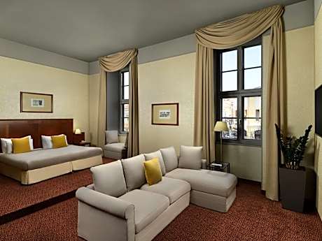 Junior Suite with Two Single Beds and Sofa Bed