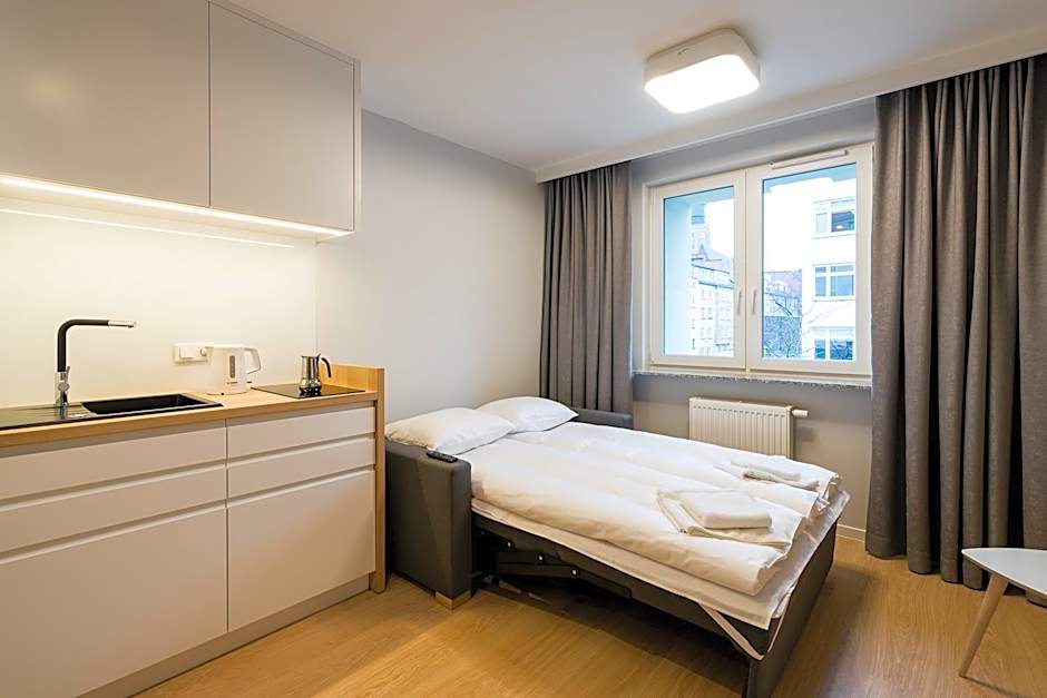 Q17 Apartments Rynek