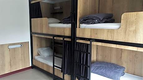 Single Bed in Dormitory Room