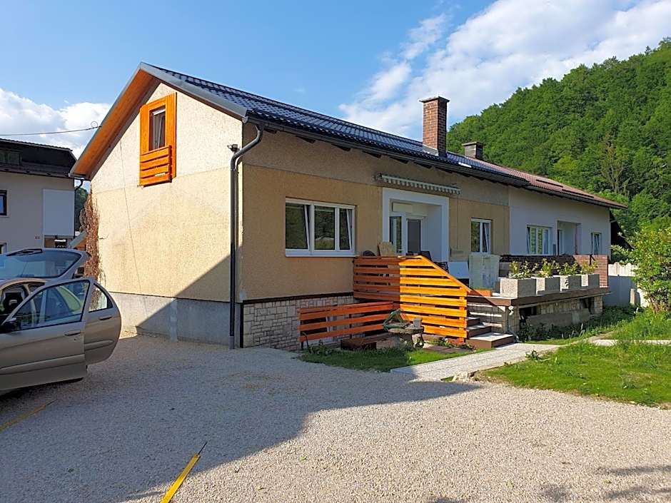 Fully equipped SIX BEDROOM HOUSE 15 kilometers from Lake Bled - with a terrace, garden, playground, and parking