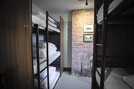 Bed in a private 9 beds room with shared bathroom
