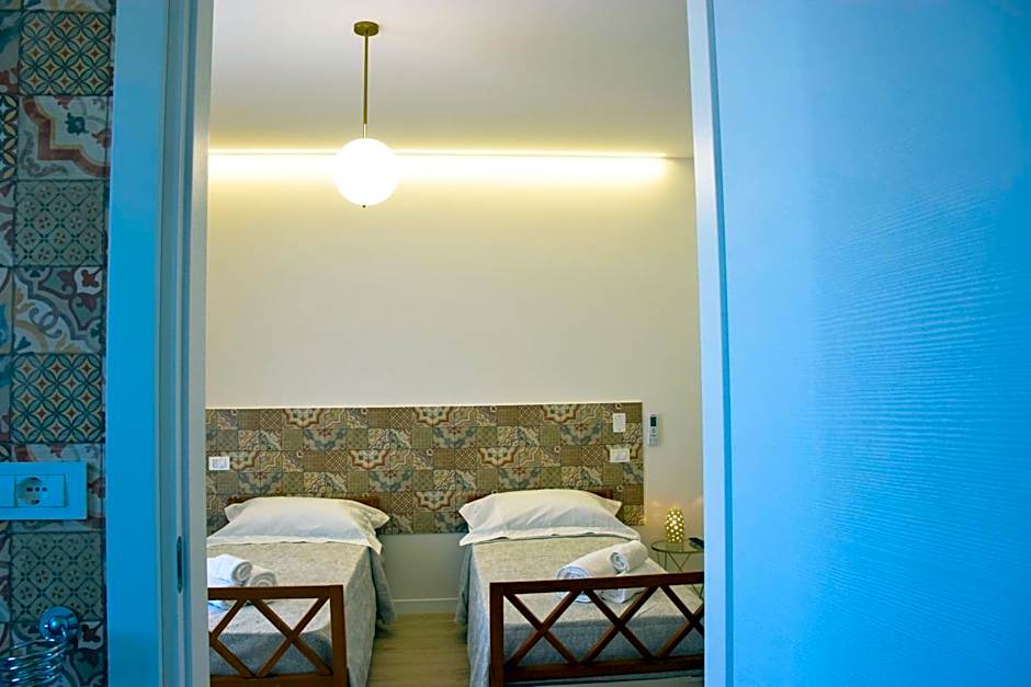 Accòmodati - Camere e Appartamenti