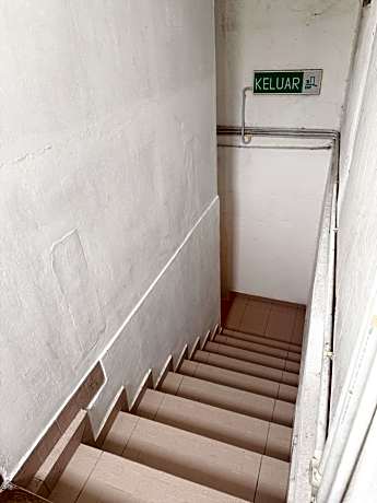 Single Bed in Dormitory Room