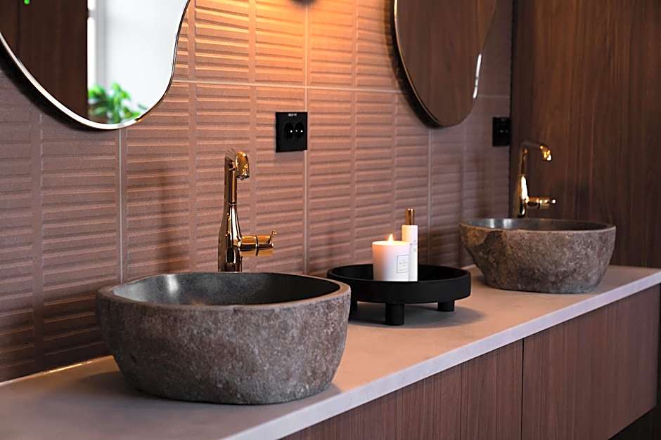 Enter St Elisabeth Suites & Spa