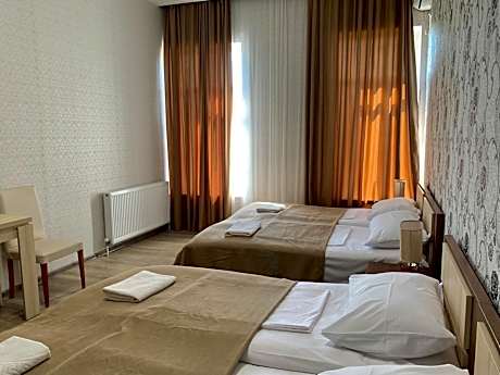 Economy Quadruple Room with Shared Bathroom