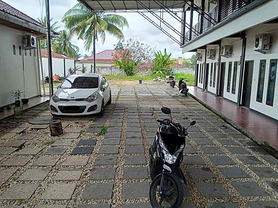 Urbanview Marthina near Jambi Town Square