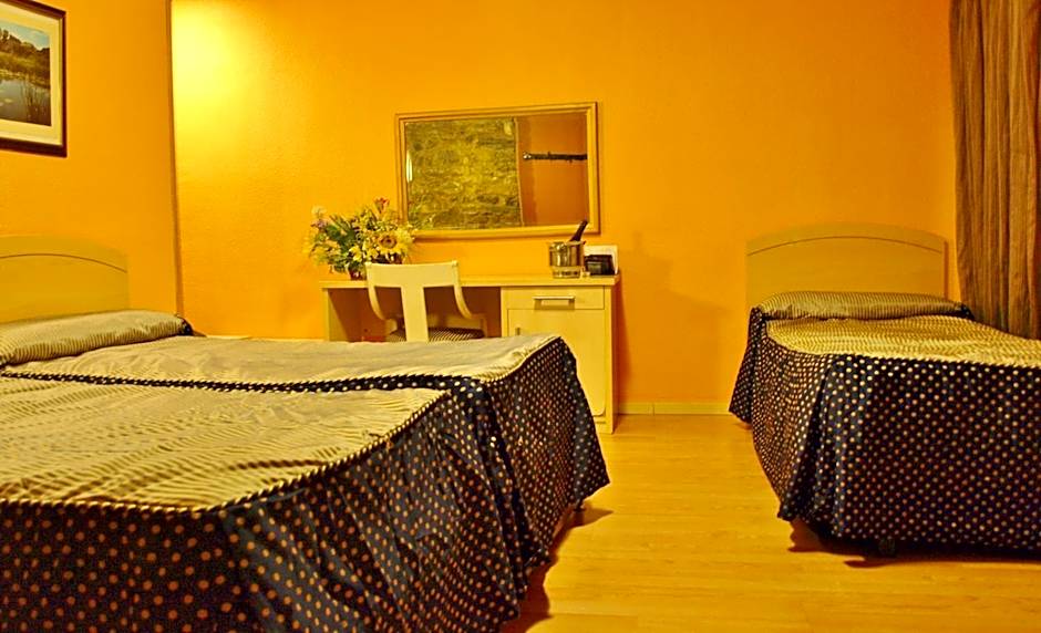 Photo 1 sur 4 de Quadruple Room