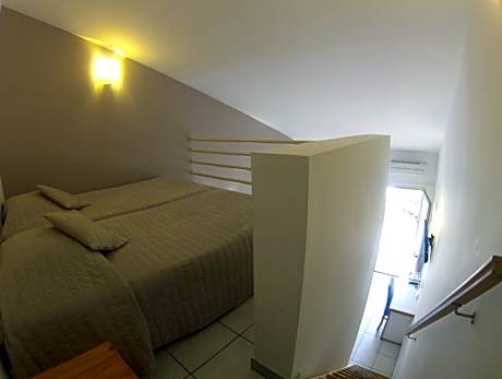 Quadruple Room (2 Adults + 2 Children under 12 Years)