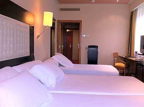 Triple Room (2 Adults + 1 Child of 12 or over)