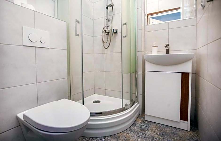 Foto 1 de 2 de Triple Room with Private Bathroom