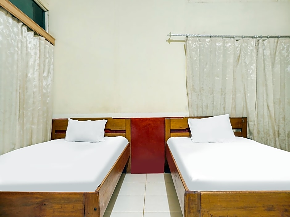 Hotel O Anggrek Daqu Syariah Kapuas