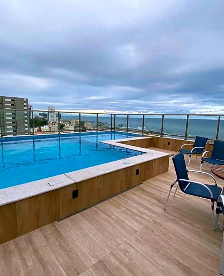 Studio aconchegante em frente a praia