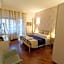 Aurelio Deluxe Rooms