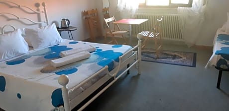 Quadruple Room with Shared Bathroom