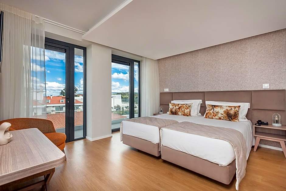 Essence Inn Marianos Hotel