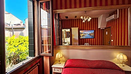 Superior Triple Room with Garden View