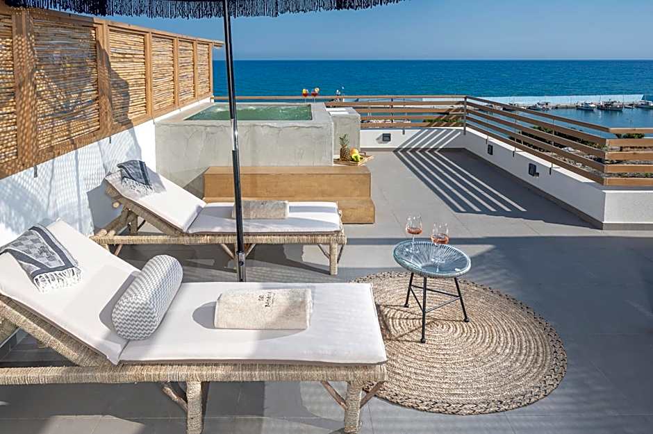 Mnḗmē Suites & Villas