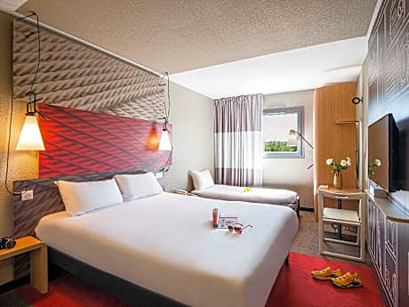 Room with One Double and One Single Bed