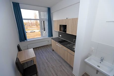 Quadruple Room with kitchen, shared bath