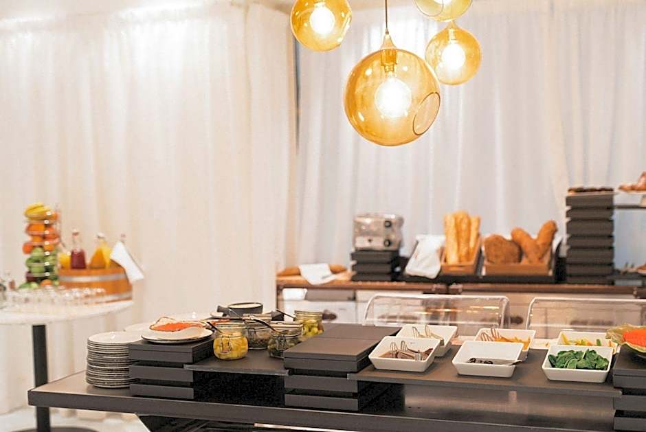 Puro Hotel Oasis Urbano