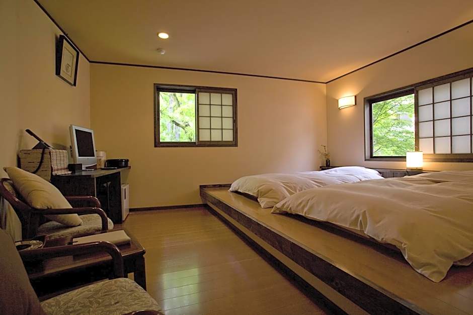 Photo 1 of 5 of Standard Twin Room with Shared Bathroom