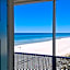 ON THE BEACH! COUPLES GETAWAY,HONEYMOON SWEET, Perfectly Cozy Beach Front Condo, full kitchen, pool, free parking,CHECK-IN AT DOOR