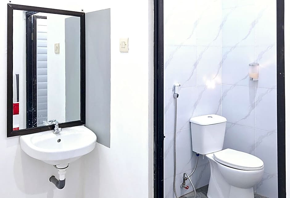 RedDoorz at Queen Asri Premium