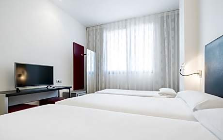 Triple Room (2 Adults + 1 Child)