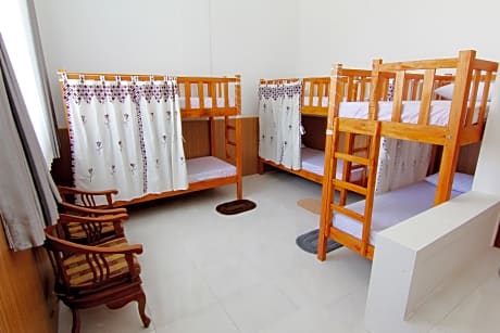 Bed in dormitory female room