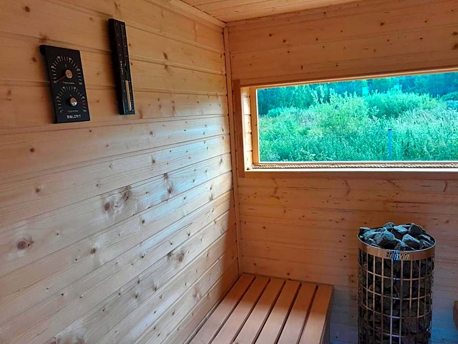 HAPPY DOMKI Z SAUNĄ Podamirowo