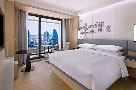 Deluxe King Room with Balcony and City View