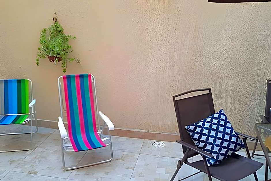 Studio pé na areia com área de churrasco privativa