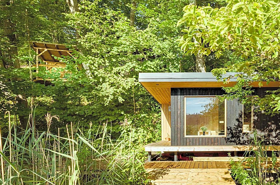 Pustelnia Supraśl - domki nad rzeką