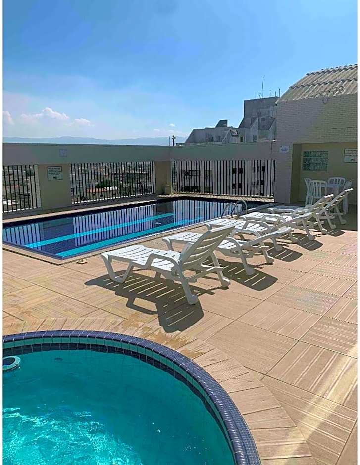 Flat -Hidromassagem privativa e Piscina a 500 mts da praia