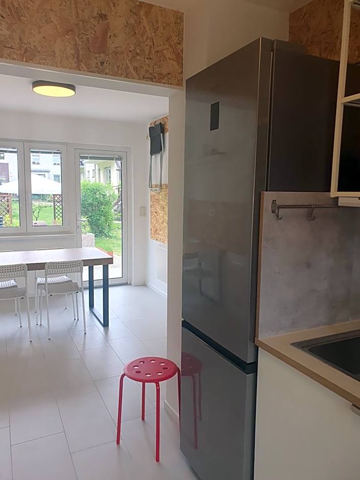 Fully equipped SIX BEDROOM HOUSE 15 kilometers from Lake Bled - with a terrace, garden, playground, and parking