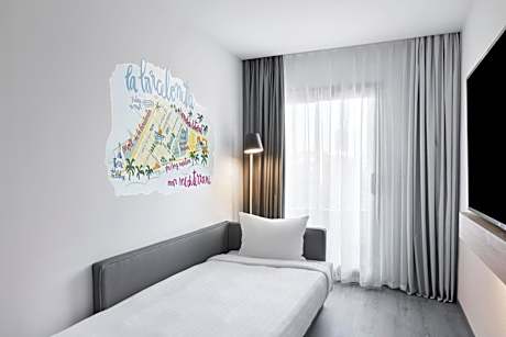 Moxy Twin Room with Sofa Bed and Balcony