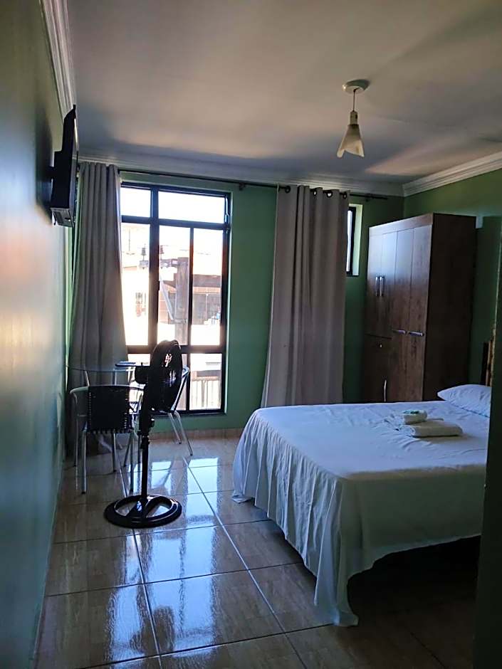 Paradise Hostel e Suítes