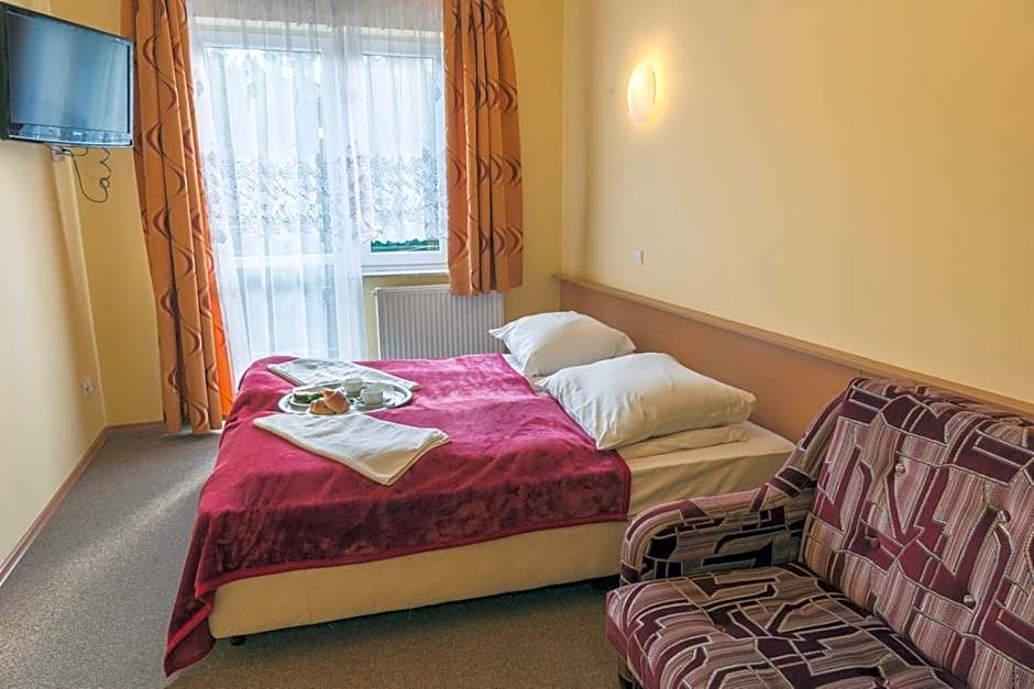 Okulski Grand Rozewie Pokoje i Apartamenty