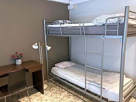 Single Bed in Dormitory Room