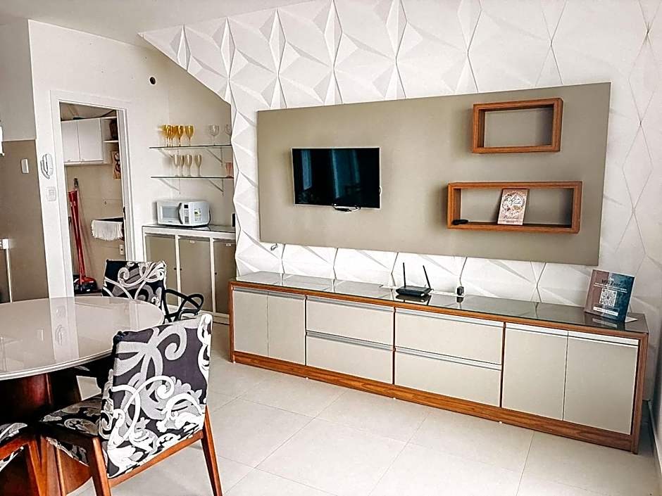 Apto Térreo com 2 quartos (ambos com ar split), sendo 1 suíte, internet privativa 300MBPS, no Residencial Vila Regina, condominio com piscina e área gourmet bem próximo a praia de Taperapuã