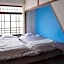 Taketa Ekimae Hostel cue