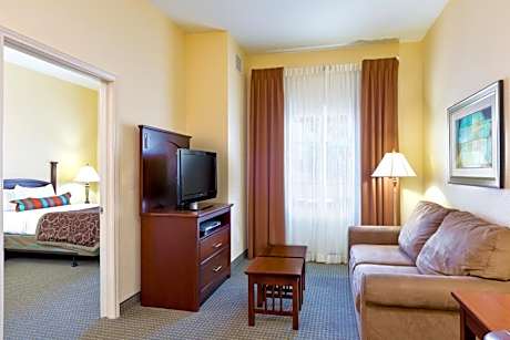 One Bedroom Suite with Queen Bed and Hearing Accessible Roll In Shower - Non-Smoking