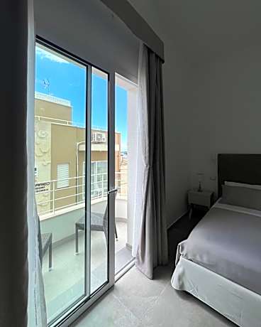 Quadruple Room with Balcony