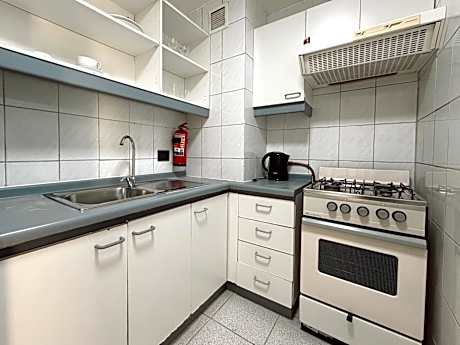 One-Bedroom Apartment (3 single beds or 1 Double bed + 1 single bed)
