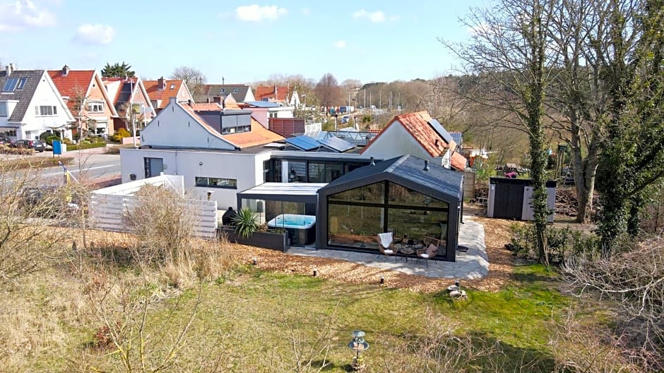 B&B het duinhuisje met jacuzzi, gratis parkeren, 2 fietsen te leen, airco