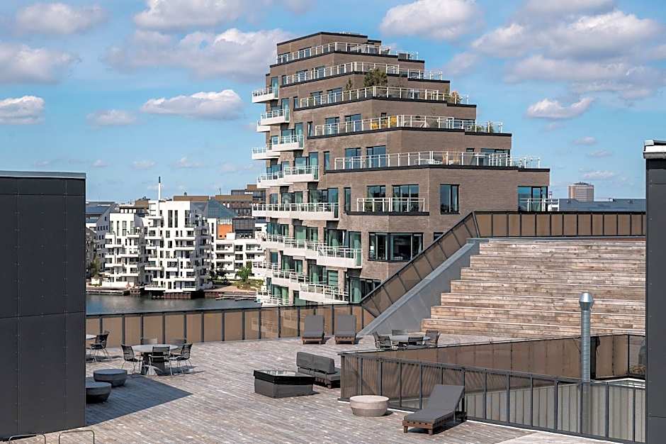 By The Pier Apartments Into This Place