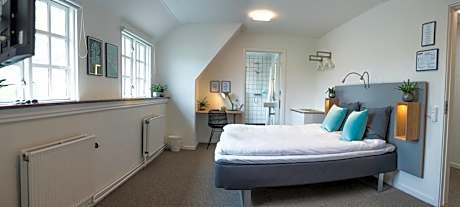 Triple Room (2 Adults + 1 Child)