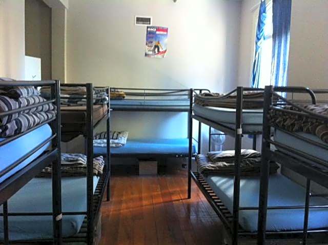 Surf 'N' Snow Backpackers Across Sky Tower