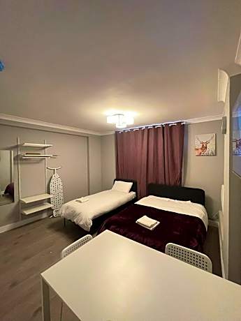 Basement Studio • Double + Single • Sleeps 3